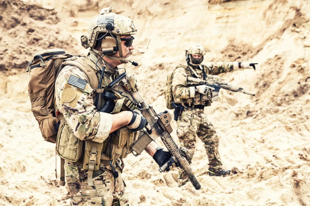 Special operations forces team raiding in desert